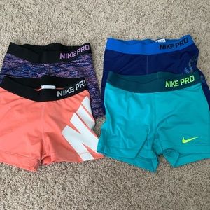 4 pairs of Nike pros
